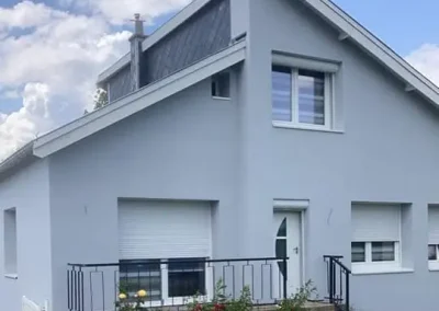 Photo de maison après isolation par l'extérieur avec enduit - Etablissements Lemaire à Fourmies